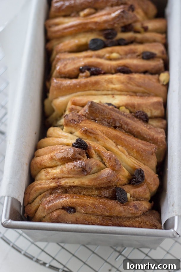 A slice of the cinnamon raisin pull-apart bread, showing the beautifully layered interior.
