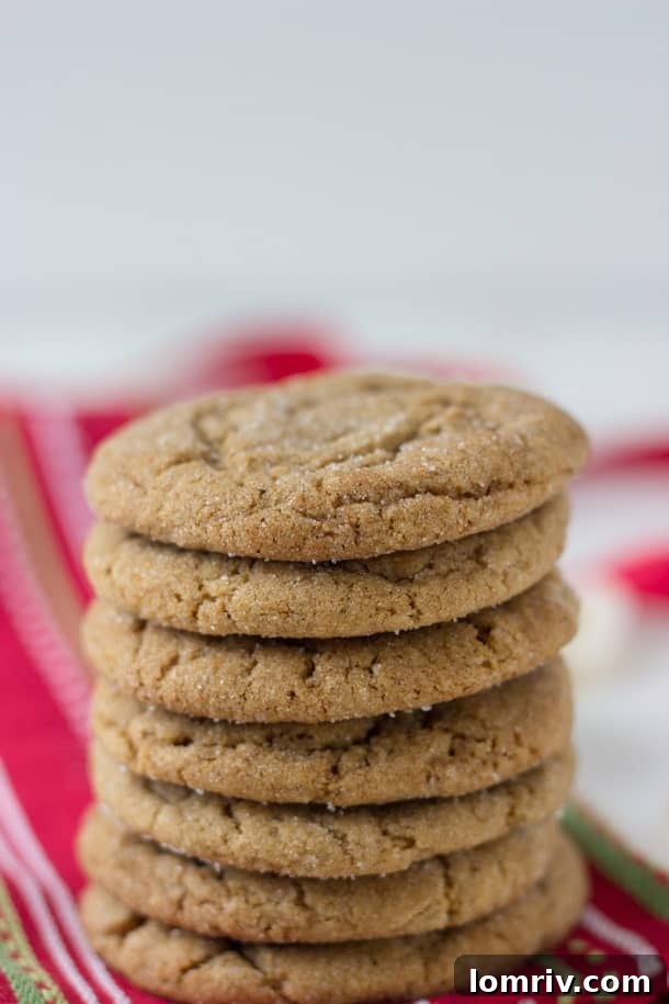 Stack of Soft and Chewy Ginger Molasses Cookies with sparkling sugar