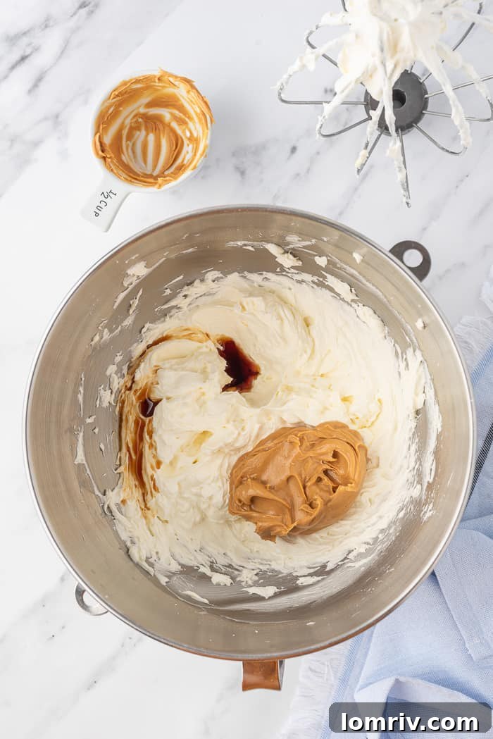 Peanut butter buttercream being mixed in a bowl
