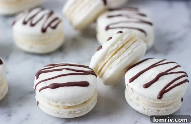 Close-up of perfectly baked Irish Cream Macarons