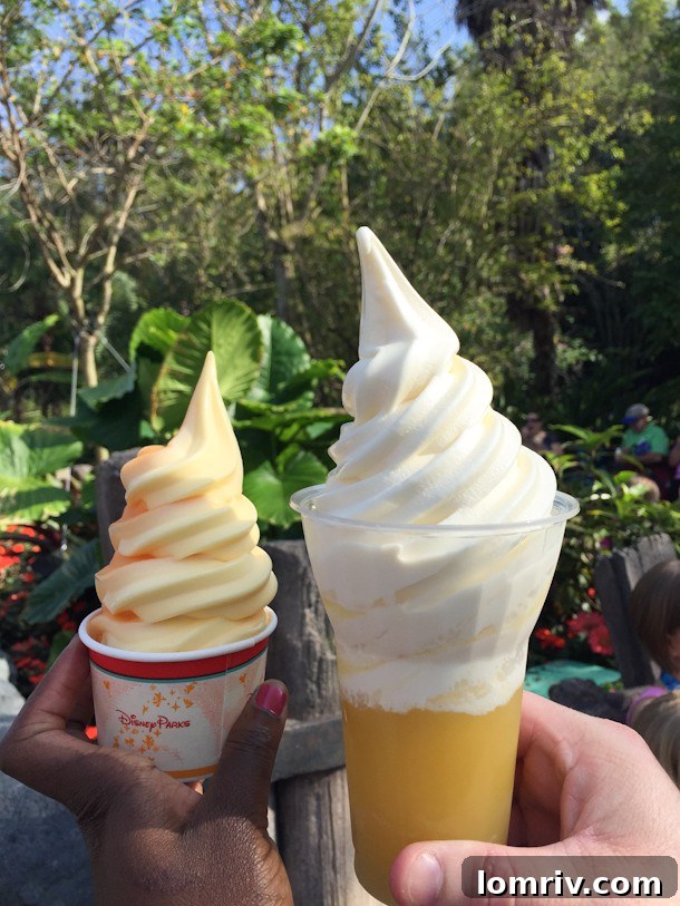 A refreshing Dole Whip, an iconic frozen pineapple treat, enjoyed during a magical first visit to Disney World.