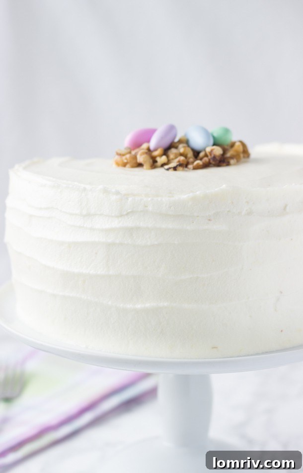Exquisite Classic Carrot Cake topped with rich Ginger Cream Cheese Frosting, a perfect blend of spices and moisture for an unforgettable dessert experience.