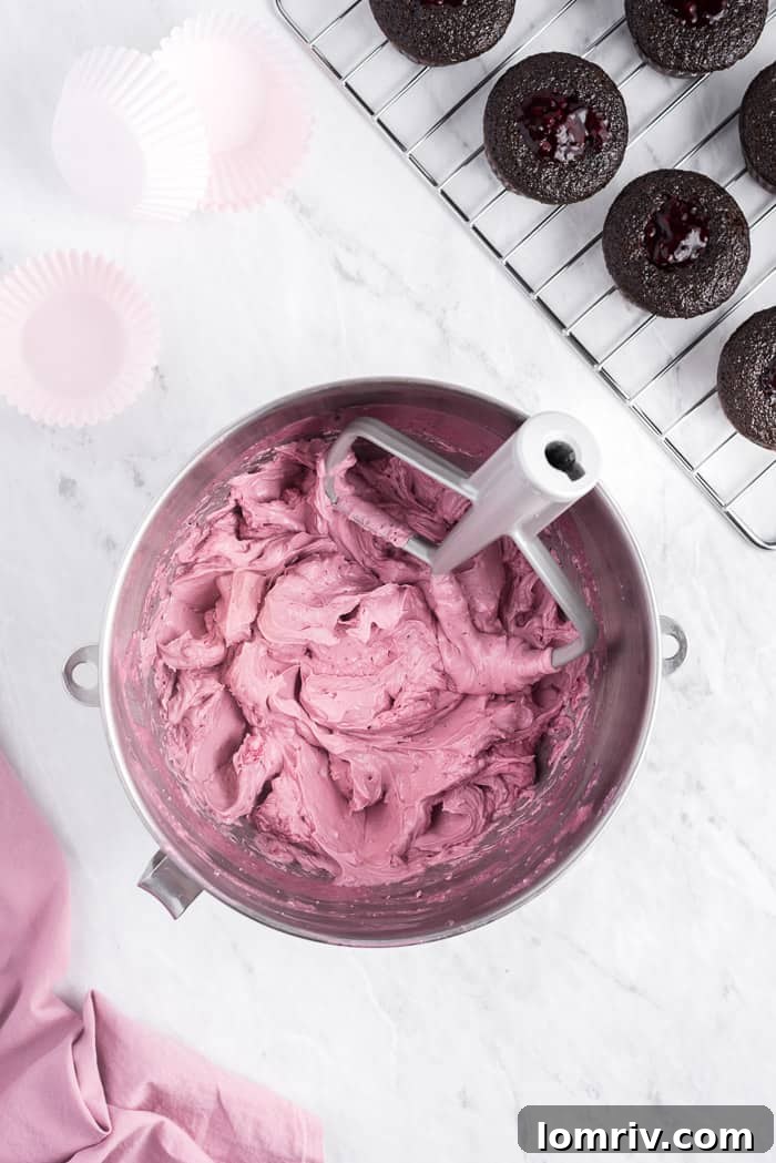 A beautifully frosted Chocolate Red Wine Cupcake, ready to be enjoyed