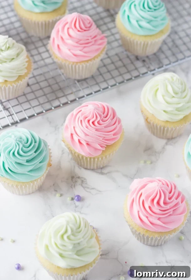 Close-up of fluffy Key Lime Cupcakes topped with creamy, zesty buttercream.