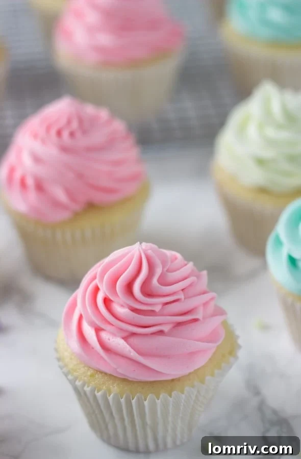 A collection of pastel Key Lime Cupcakes, showcasing their vibrant and appealing colors.