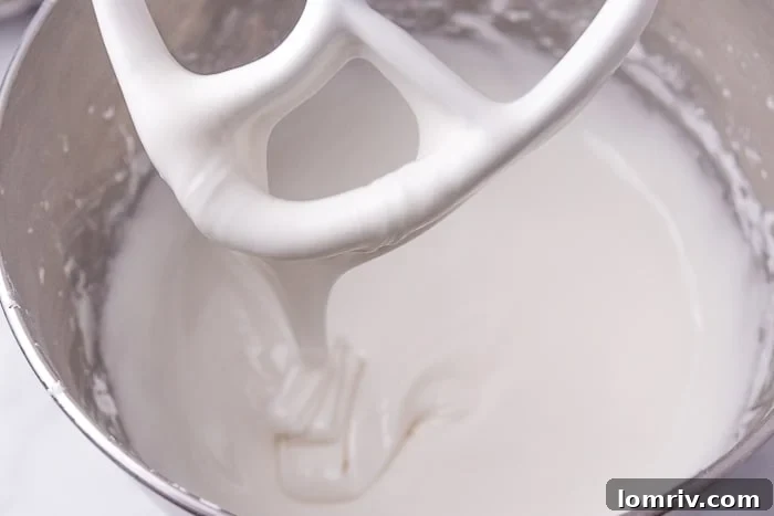 Adding Powdered Sugar to Royal Icing Base