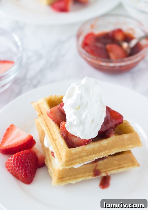 This Easy Coconut Waffles recipe, featuring a buttermilk pancake mix and crowned with a vibrant strawberry rhubarb compote, promises a perfect brunch experience.