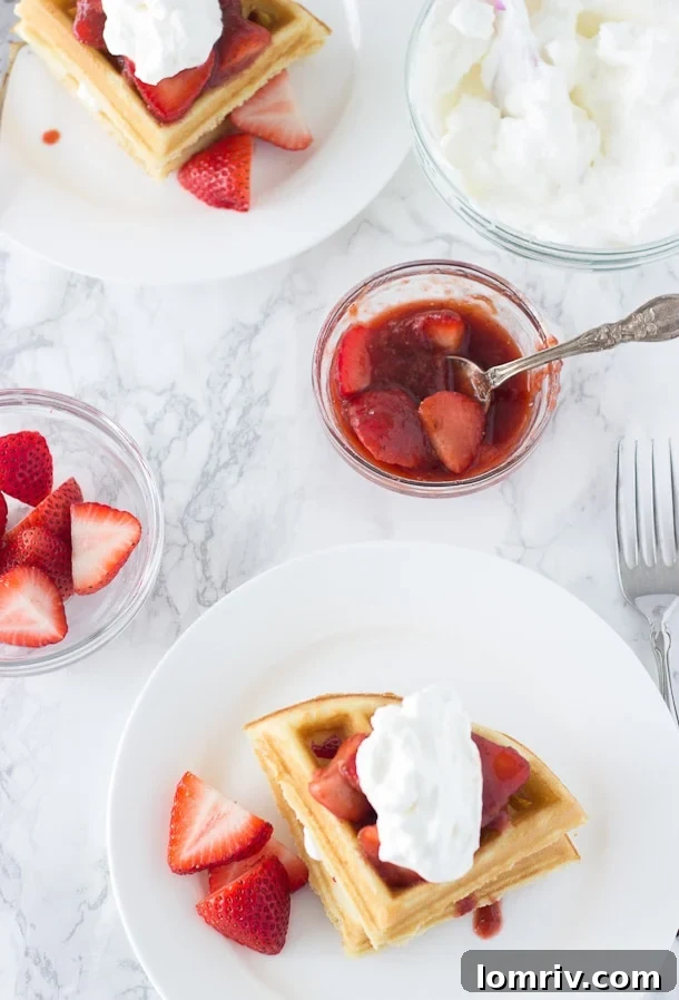 This Easy Coconut Waffles recipe, crafted from a buttermilk pancake mix and generously topped with a homemade strawberry rhubarb compote, is ideal for brunch.