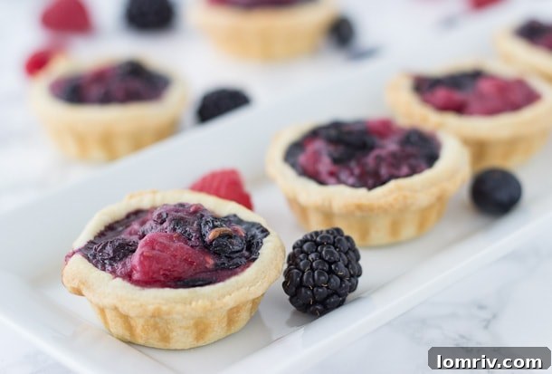 Close-up of freshly baked Mixed Berry Mini Tarts
