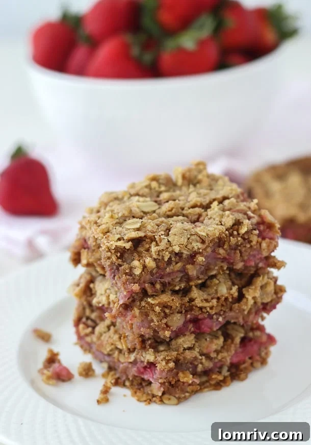 Hearty and sweet, these Strawberry Oatmeal Bars are great for breakfast, a quick afternoon snack or dessert. 
